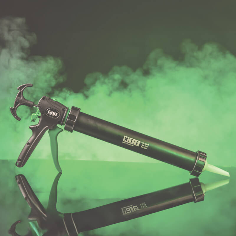 foil gun on green background